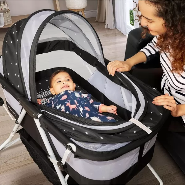 Karley Bassinet in Cool Grey, Lightweight Portable Baby Bassinet, Quick Fold and Easy to Carry , Adjustable Double Canopy, Indoor and Outdoor Bassinet with Large Storage Basket.