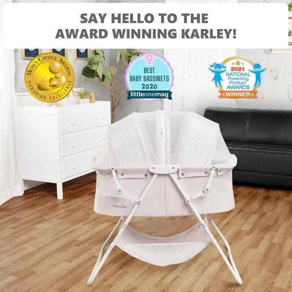 Karley Bassinet in Cool Grey, Lightweight Portable Baby Bassinet, Quick Fold and Easy to Carry , Adjustable Double Canopy, Indoor and Outdoor Bassinet with Large Storage Basket.