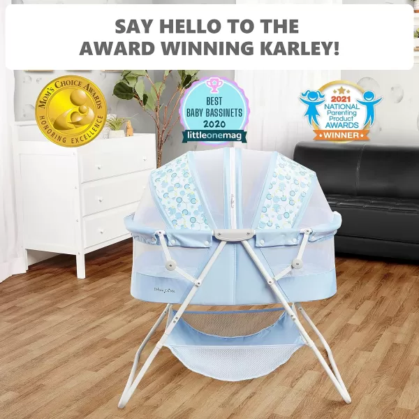 Karley Bassinet in Cool Grey, Lightweight Portable Baby Bassinet, Quick Fold and Easy to Carry , Adjustable Double Canopy, Indoor and Outdoor Bassinet with Large Storage Basket.