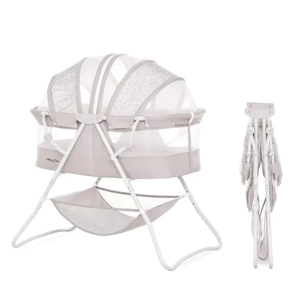 Karley Bassinet in Cool Grey, Lightweight Portable Baby Bassinet, Quick Fold and Easy to Carry , Adjustable Double Canopy, Indoor and Outdoor Bassinet with Large Storage Basket.