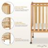 imageDream On Me 2 in 1 Portable Folding Stationary Side Crib in Espresso Greenguard Gold Certified 40x26x38 Inch Pack of 1Natural