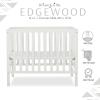 imageDream On Me Edgewood 4In1 Convertible Mini Crib In White JPMA Certified NonToxic Finish New Zealand Pinewood With 3 Mattress Height Settings Included 1quot Mattress PadWhite