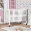 imageDream On Me Folding Full Size Convenience Crib In Storm Grey Two Adjustable Mattress Height Positions Comes With Heavy Duty Locking Wheels Flat FoldingWhite