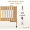 imageDream On Me Folding Full Size Convenience Crib In Storm Grey Two Adjustable Mattress Height Positions Comes With Heavy Duty Locking Wheels Flat FoldingNatural