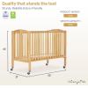 imageDream On Me Folding Full Size Convenience Crib In Storm Grey Two Adjustable Mattress Height Positions Comes With Heavy Duty Locking Wheels Flat FoldingNatural
