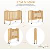 imageDream On Me Folding Full Size Convenience Crib In Storm Grey Two Adjustable Mattress Height Positions Comes With Heavy Duty Locking Wheels Flat FoldingNatural