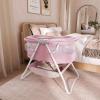 imageDream On Me Karley Bassinet in Blue ampamp Grey Lightweight Portable Baby Bassinet Quick Fold and Easy to Carry  Adjustable Double Canopy Indoor and Outdoor Bassinet with Large Storage BasketPink