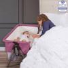 imageDream On Me Lotus Bassinet and Bedside Sleeper in Ivory Lightweight and Portable Baby Bassinet Adjustable Height Position Easy to Fold and Carry Travel Bassinet Carry Bag IncludedBerry Pink