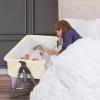 imageDream On Me Lotus Bassinet and Bedside Sleeper in Ivory Lightweight and Portable Baby Bassinet Adjustable Height Position Easy to Fold and Carry Travel Bassinet Carry Bag IncludedIvory
