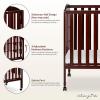 imageDream On Me 3 in 1 Portable Folding Stationary Side Crib in Steel Grey Greenguard Gold Certified Safety Wheels with Locking Casters Convertible 3 Mattress HeightsEspresso