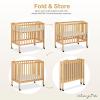 imageDream On Me 3 in 1 Portable Folding Stationary Side Crib in Steel Grey Greenguard Gold Certified Safety Wheels with Locking Casters Convertible 3 Mattress HeightsNatural