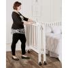 imageDream On Me 3 in 1 Portable Folding Stationary Side Crib in Steel Grey Greenguard Gold Certified Safety Wheels with Locking Casters Convertible 3 Mattress HeightsWhite