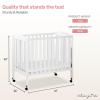 imageDream On Me 3 in 1 Portable Folding Stationary Side Crib in Steel Grey Greenguard Gold Certified Safety Wheels with Locking Casters Convertible 3 Mattress HeightsWhite