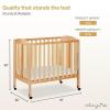 imageDream On Me 3 in 1 Portable Folding Stationary Side Crib in Steel Grey Greenguard Gold Certified Safety Wheels with Locking Casters Convertible 3 Mattress HeightsNatural