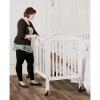 imageDream On Me 3 in 1 Portable Folding Stationary Side Crib in Steel Grey Greenguard Gold Certified Safety Wheels with Locking Casters Convertible 3 Mattress HeightsWhite