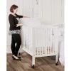 imageDream On Me 3 in 1 Portable Folding Stationary Side Crib in Steel Grey Greenguard Gold Certified Safety Wheels with Locking Casters Convertible 3 Mattress HeightsWhite