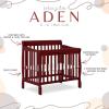 imageDream On Me Aden 4in1 Convertible Mini Crib In Grey Greenguard Gold Certified NonToxic Finish New Zealand Pinewood With 3 Mattress Height SettingsCherry