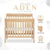 imageDream On Me Aden 4in1 Convertible Mini Crib In Grey Greenguard Gold Certified NonToxic Finish New Zealand Pinewood With 3 Mattress Height SettingsNatural