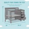 imageDream On Me Jayden 4in1 Mini Convertible Crib And Changer in Storm Grey Greenguard Gold Certified NonToxic Finish New Zealand Pinewood 1quot Mattress PadStorm Grey