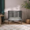 imageDream On Me Jett NonFull Size Folding Convertible Crib Lightweight Portable Crib Three Adjustable Mattress Height Settings Easy to Fold Travel Crib 15 Mattress Pad IncludedPebble Grey
