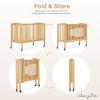 imageDream On Me FullSize 2in1 Folding Baby Crib in Natural GreenGuard Gold ampamp JPMA Portable Patented Quick Folding System Strong Wheels 2 Adjustable Mattress HeightsNatural