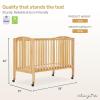 imageDream On Me FullSize 2in1 Folding Baby Crib in Natural GreenGuard Gold ampamp JPMA Portable Patented Quick Folding System Strong Wheels 2 Adjustable Mattress HeightsNatural