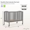 imageDream On Me FullSize 2in1 Folding Baby Crib in Natural GreenGuard Gold ampamp JPMA Portable Patented Quick Folding System Strong Wheels 2 Adjustable Mattress HeightsSteel Grey