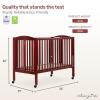 imageDream On Me FullSize 2in1 Folding Baby Crib in Natural GreenGuard Gold ampamp JPMA Portable Patented Quick Folding System Strong Wheels 2 Adjustable Mattress HeightsCherry