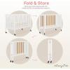 imageDream On Me Quinn FullSize Portable Baby Crib in White GreenGuard Gold ampamp JPMA Patented Quick Fold System Adjustable Mattress Support Smooth Wheels Compact Design Safe Sleep AssuranceWhite