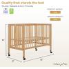 imageDream On Me Quinn FullSize Portable Baby Crib in White GreenGuard Gold ampamp JPMA Patented Quick Fold System Adjustable Mattress Support Smooth Wheels Compact Design Safe Sleep AssuranceNatural