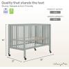 imageDream On Me Quinn FullSize Portable Baby Crib in White GreenGuard Gold ampamp JPMA Patented Quick Fold System Adjustable Mattress Support Smooth Wheels Compact Design Safe Sleep AssuranceCool Grey