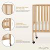imageDream On Me Quinn FullSize Portable Baby Crib in White GreenGuard Gold ampamp JPMA Patented Quick Fold System Adjustable Mattress Support Smooth Wheels Compact Design Safe Sleep AssuranceNatural