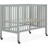 imageDream On Me Quinn FullSize Portable Baby Crib in White GreenGuard Gold ampamp JPMA Patented Quick Fold System Adjustable Mattress Support Smooth Wheels Compact Design Safe Sleep AssuranceCool Grey