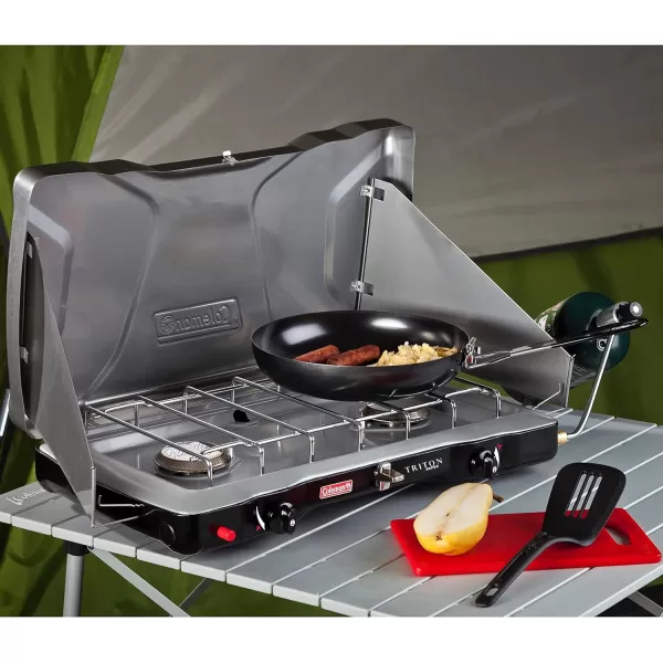 Coleman Triton+ 2-Burner Propane Camping Stove, Push-Button Instant Ignition, Portable Camp Grill, Adjustable Burners, Wind Guards, 22,000 Total BTUs of Power, Beach Cookouts, Backyard BBQ, Tailgating