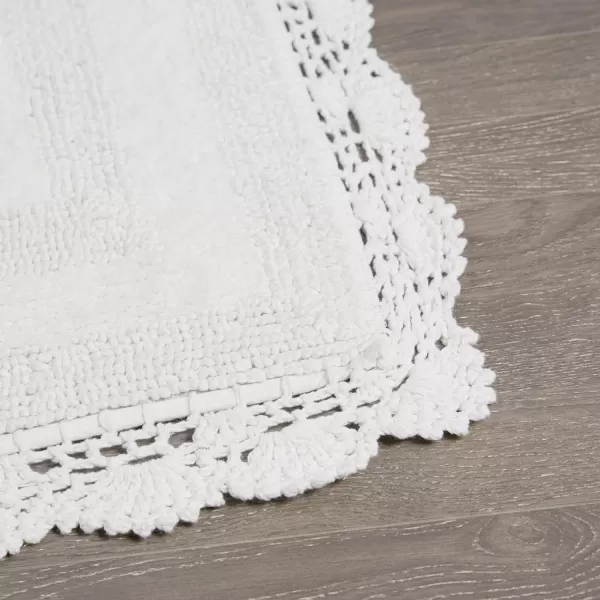 Laura Ashley Crochet Cotton 17x24 in. Bath Rug, Indigo