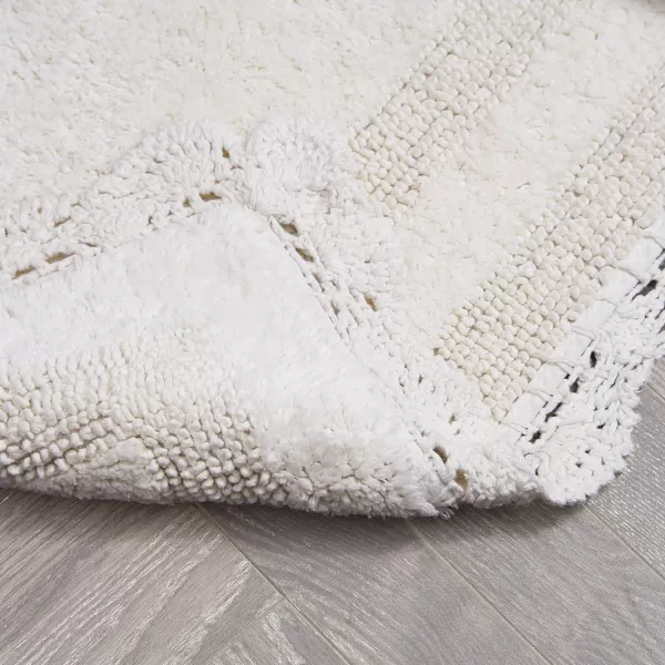 Laura Ashley Crochet Cotton 17x24 in. Bath Rug, Indigo