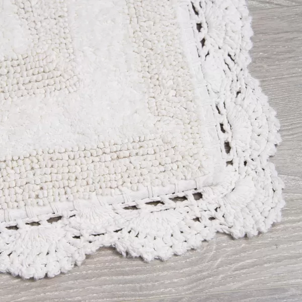 Laura Ashley Crochet Cotton 17x24 in. Bath Rug, Indigo