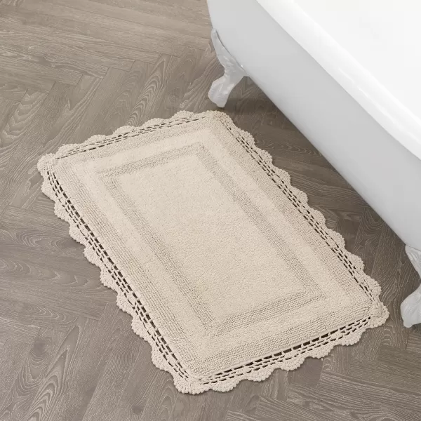 Laura Ashley Crochet Cotton 17x24 in. Bath Rug, Indigo