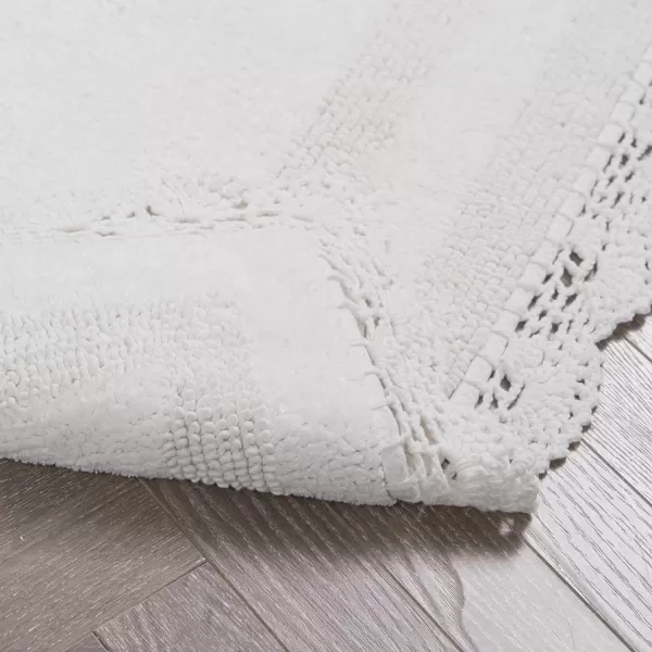 Laura Ashley Crochet Cotton 17x24 in. Bath Rug, Indigo
