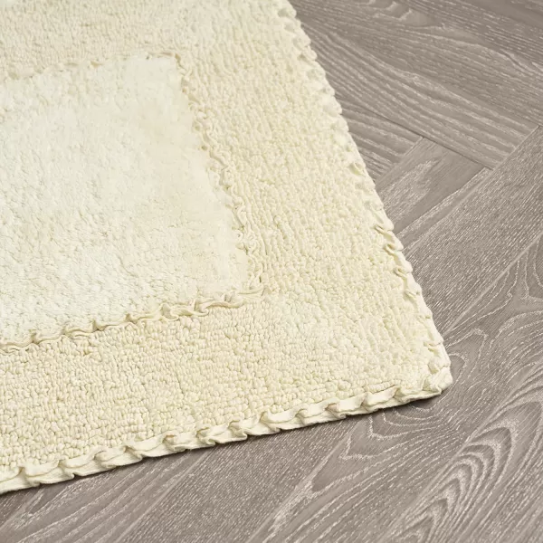 Laura Ashley Ruffle Cotton 2-Piece Bath Rug Set, Ivory