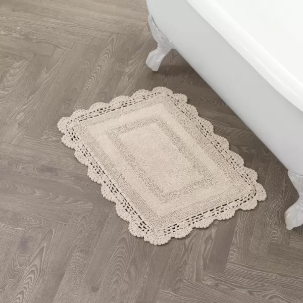 Laura Ashley Crochet Cotton 17x24 in. Bath Rug, Indigo