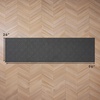 image:imageLaura Ashley HiLow Tufted 26 x 60 Washable SkidResistant Runner Rug  Dusty Navy Feya SolidAustell Solid Dark Grey