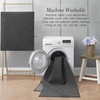 image:imageLaura Ashley HiLow Tufted 26 x 60 Washable SkidResistant Runner Rug  Dusty Navy Feya SolidAustell Solid Dark Grey