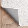 image:imageLaura Ashley HiLow Tufted 26 x 60 Washable SkidResistant Runner Rug  Dusty Navy Feya SolidAustell Solid Ivory