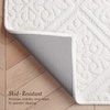 image:imageLaura Ashley HiLow Tufted 26 x 60 Washable SkidResistant Runner Rug  Dusty Navy Feya SolidAustell Solid Ivory