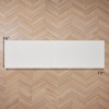 image:imageLaura Ashley HiLow Tufted 26 x 60 Washable SkidResistant Runner Rug  Dusty Navy Feya SolidFeya Solid Ivory