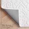 image:imageLaura Ashley HiLow Tufted 26 x 60 Washable SkidResistant Runner Rug  Dusty Navy Feya SolidFeya Solid Ivory