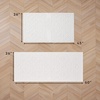 image:imageLaura Ashley HiLow Tufted 26 x 60 Washable SkidResistant Runner Rug  Dusty Navy Feya SolidFeya Solid Ivory