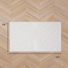 image:imageLaura Ashley HiLow Tufted 26 x 60 Washable SkidResistant Runner Rug  Dusty Navy Feya SolidFeya Solid Ivory