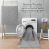 image:imageLaura Ashley HiLow Tufted 26 x 60 Washable SkidResistant Runner Rug  Dusty Navy Feya SolidFeya Solid Light Grey